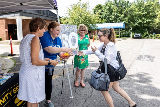 Army Community Service staff members celebrate the program’s 60th birthday at Fort Knox, Kentucky, July 7, 2025. The early celebration featured free children’s books and popsicles as well as information on ACS resources. The ACS program’s...