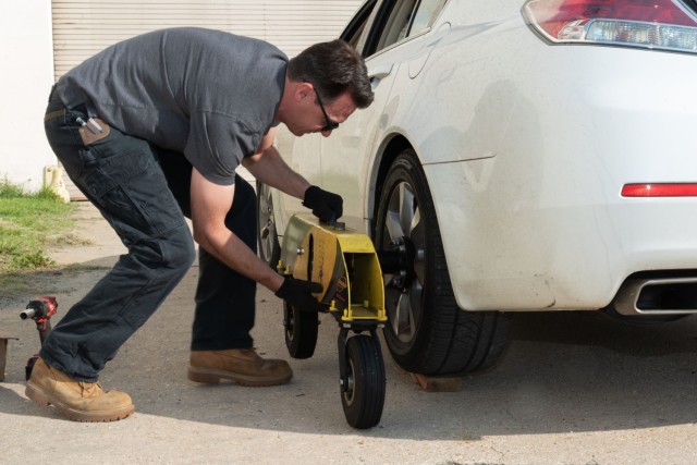 Bernard Duplan installs skid simulators, which are used to elevate the rear wheels and initiate oversteer at lower speeds. Drivers learn how loss of traction feels and apply techniques to correct it.