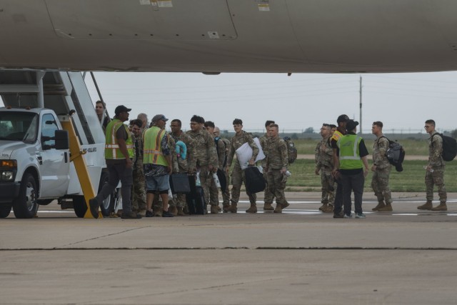 Soldiers assigned to 1st Battalion, 14th Field Artillery Regiment (1-14th FAR), 75th Field Artillery Brigade, loaded onto an airplane for their deployment to Grafenwoehr, Germany, in Fort Sill, Oklahoma, June 28, 2025. 1-14th FAR stands ready to...