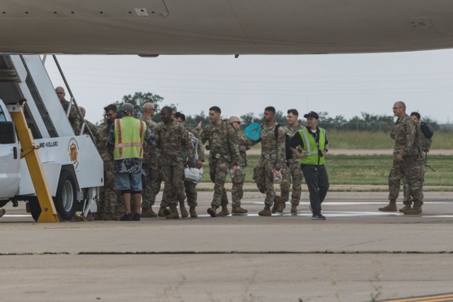Soldiers assigned to 1st Battalion, 14th Field Artillery Regiment (1-14th FAR), 75th Field Artillery Brigade, loaded onto an airplane for their deployment to Grafenwoehr, Germany, in Fort Sill, Oklahoma, June 28, 2025. 1-14th FAR stands ready to...