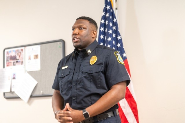 Sgt. Dario Lykes, Security Guard of the Year for Redstone Arsenal, speaks during his award ceremony July 2 at the police station.