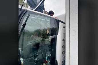 Connecticut Guard Soldier Aids Rollover Crash Victim in Dramatic Highway Rescue