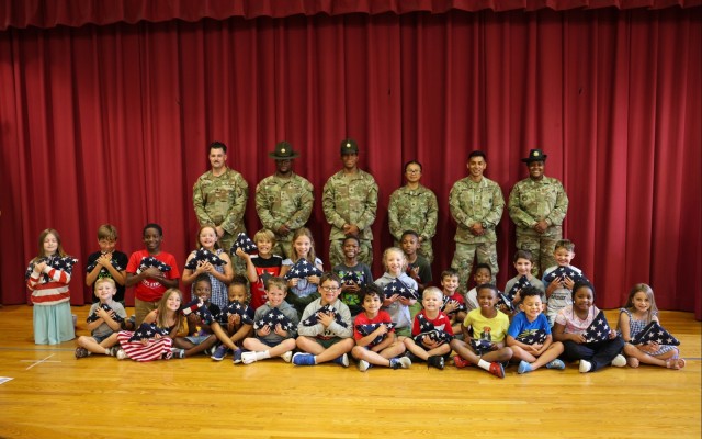 Fort Lee Funeral Honors Team Demonstrate Flag Folding to Youth