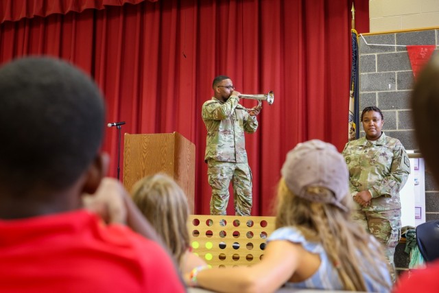 Fort Lee Funeral Honors Team Demonstrate Flag Folding to Youth