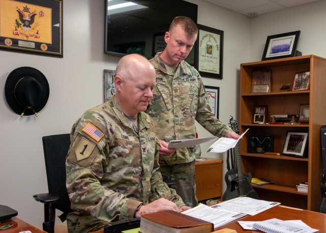 New Maneuver Support Center of Excellence Command Chaplain (Col.) Craig Ludwig (left) and Resource Manager Chaplain (Maj.) Travis Hairston review their schedules to confirm the Religious Support Office is ready to support Fort Leonard Wood’s...