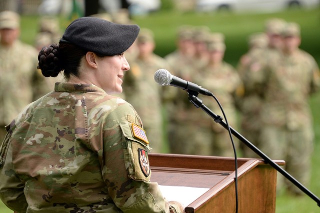 Incoming Midwest Joint Regional Correctional Facility Battalion (Corrections) Command Sgt. Maj. Nickie Wileman delivers remarks during her change of responsibility ceremony with outgoing MWJRCF Battalion Command Sgt. Maj. Travis Huggard June 27,...