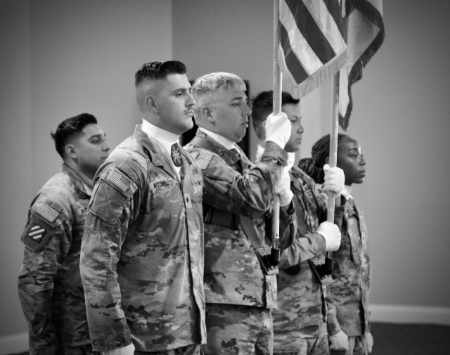 Soldiers of the National Training Center and Fort Irwin form a color to guard during Command Sgt. Maj. DeMarius M. Lyles Assumption of Responsibility ceremony 10 July, 2025 held at the Sandy Basic Community Center.