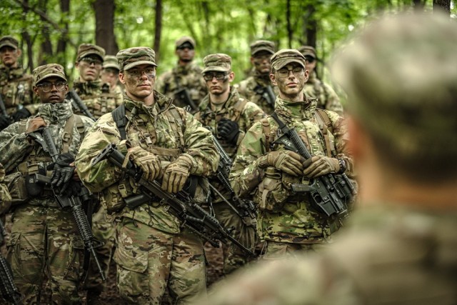 Cadets learn how to start a fire while receiving survival instruction from task force soldiers from the 101st Airborne Division June 10 during Cadet Summer Training. Photo by Jorge Garcia/ USMA-PAO.