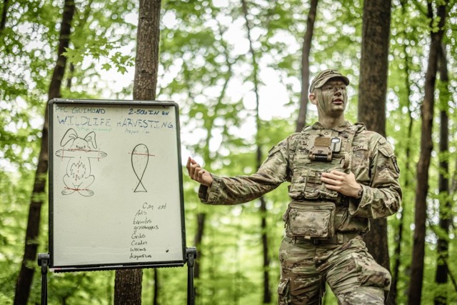 Cadets learn how to start a fire while receiving survival instruction from task force soldiers from the 101st Airborne Division June 10 during Cadet Summer Training. Photo by Jorge Garcia/ USMA-PAO.