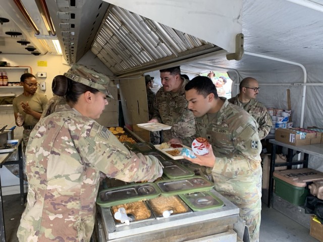At Forward Operation Site, Torun, Poland, Soldiers line up to receive brunch from the containerized kitchen for Operation Big Eatz, September 2024.