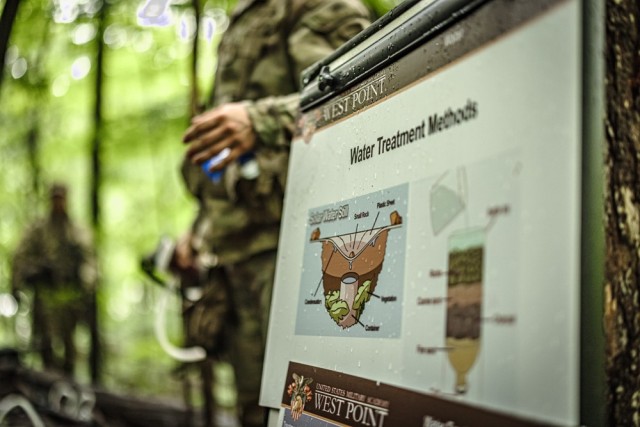 Cadets learn how to start a fire while receiving survival instruction from task force soldiers from the 101st Airborne Division June 10 during Cadet Summer Training. Photo by Jorge Garcia/ USMA-PAO.