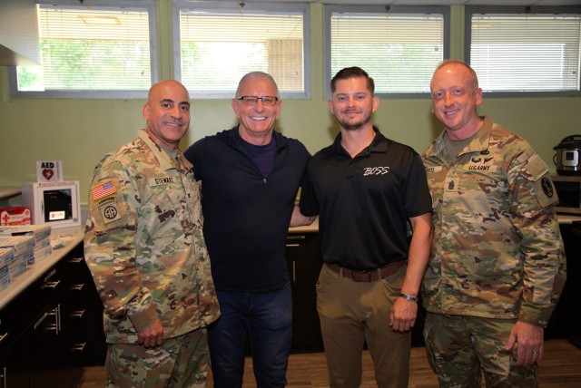 During a tour of the Fort Belvoir Better Opportunity for Single Soldiers (BOSS) building, Garrison Commander, Col. David Stewart (left), Garrison Command Sergeant Major, Command Sgt. Maj. Brandon Creel (far right), and BOSS President Sgt. 1st...