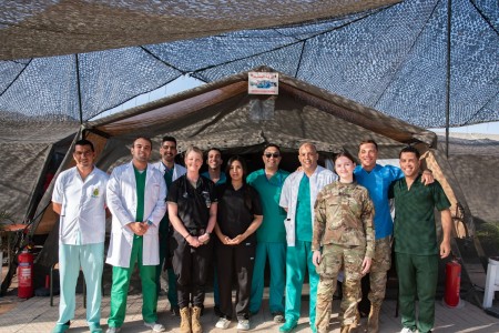 Humanitarian leaders pose for photo.