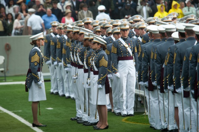 West Point First Captain Lindsey Danilack calls the graduating class of 2014 to attention in preparation for their graduation and commissioning ceremony at the U.S. Military Academy, New York.