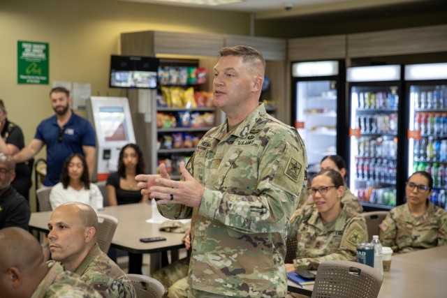 An officer assigned to the Office of Chief of the Army Reserve engages with Chef Robert Irvine about the future of fueling the warfighter. Founder of the Robert Irvine Foundation, Irvine has been actively advocating for improved dining options...