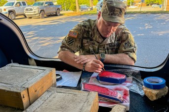 Soldier creates hand-painted mementos for fellow Hurricane Helene relief team members