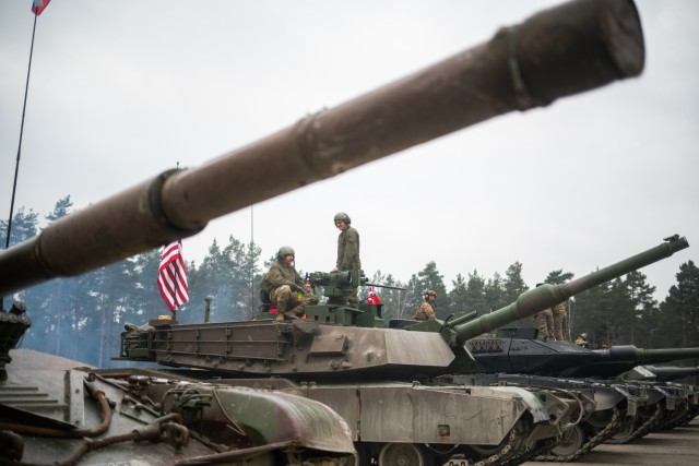 U.S. Soldiers from the 3rd Infantry Division occupy an M1A2 SEP V2 tank as a part of the U.S. Army Europe and Africa International Tank Challenge at 7th Army Training Command’s Grafenwoehr Training Area, Germany.  (U.S. Army Photo by Spc. Elijah...