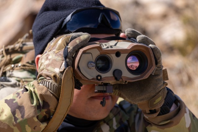 U.S. Army Sgt. Christian Claros, assigned to the 82nd Airborne Division, trains on identifying a target with a laser target locator during Project Convergence-Capstone 5 (PC-C5) on Fort Irwin, Calif. PC-C5 builds on previous experiments to...
