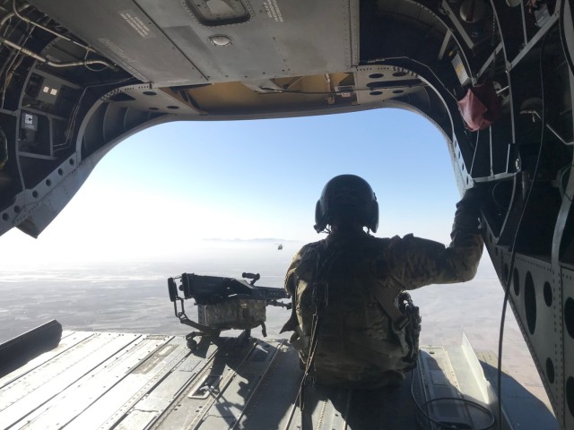Chinook in flight supporting a base infrastructure project