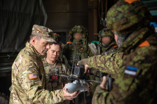 Gen. Christopher Donahue, the commanding general of U.S. Army Europe and Africa (USAREUR-AF), holds an Estonian soldier&#39;s drone during Exercise Hedgehog 25 near Camp Reedo, Estonia on May 15, 2025. Exercise Hedgehog 25 is a large-scale...