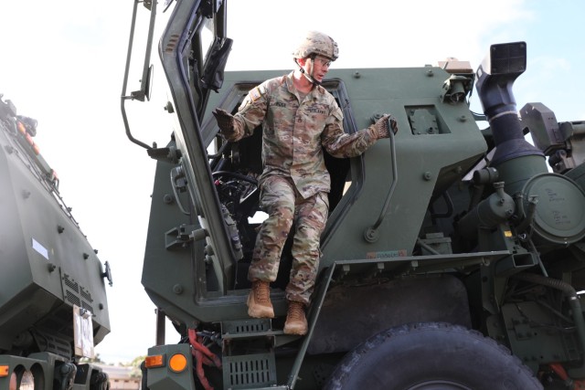 A soldier assigned to the 25th Infantry Division exits a flatbed truck during the loading process of High Mobility Artillery Rocket Systems at Joint Base Pearl Harbor-Hickam, Hawaii, July 14, 2025. The launchers are bound for a new mission with...