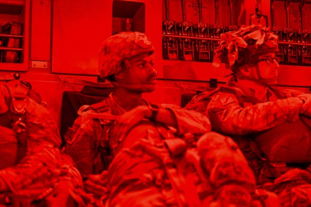 U.S. Army paratroopers assigned to the 2nd Infantry Brigade Combat Team (Airborne), 11th Airborne Division, prepare to jump from a C-17 Globemaster assigned to the 154th Operations Wing in support of exercise Talisman Sabre 2025 near Queensland,...