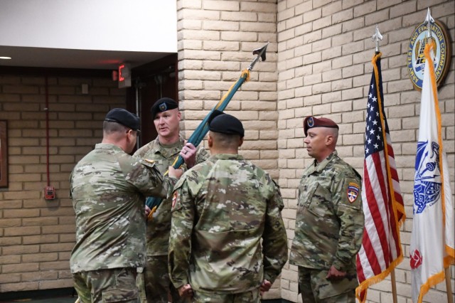 Command Sgt. Maj. Joshua Holthus receives the guidon from U.S. Army Yuma Proving Ground (YPG) Commander Col. John Nelson (left) in a Change of Responsibility Ceremony on July 17, 2025. Holthus succeeds Command Sgt. Maj. Mark Millare, who served as...