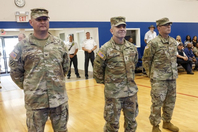 (L-R) Former Anniston Army Depot Commander Col. Craig Daniel, U.S. Army Tank-automotive and Armaments Command Commanding General Maj. Gen. Michael Lalor, and current ANAD Commander Col. Charles Moore stand together at the beginning of the Change...