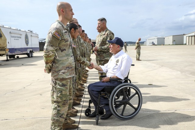 Air Force Gen. Steve Nordhaus, 30th Chief of the National Guard Bureau, and Senior Enlisted Advisor John Raines, SEA to the CNGB, join Texas Gov. Greg Abbott and Air Force Maj. Gen. Thomas Suelzer, the adjutant general of Texas, for an aerial...