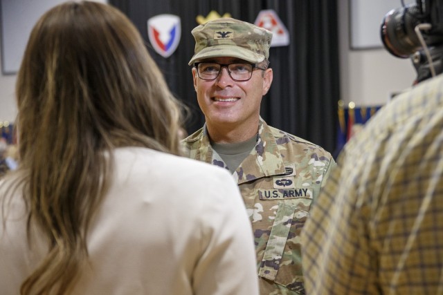 Anniston Army Depot Commander Col. Charles Moore smiles as he talks to reporters after the conclusion of the July. 16, 2025 Change of Command ceremony.