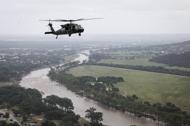 Air Force Gen. Steve Nordhaus, 30th Chief of the National Guard Bureau, and Senior Enlisted Advisor John Raines, SEA to the CNGB, join Texas Gov. Greg Abbott and Air Force Maj. Gen. Thomas Suelzer, the adjutant general of Texas, for an aerial...