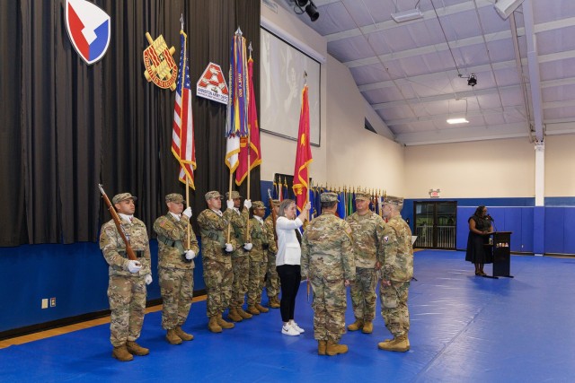 The official party and the U.S. Army Tank-automotive and Armaments Command color guard stand as Anniston Army Depot&#39;s unit colors are transferred from outgoing Commander Col. Craig Daniel to TACOM Commanding General Maj. Gen. Michael Lalor,...