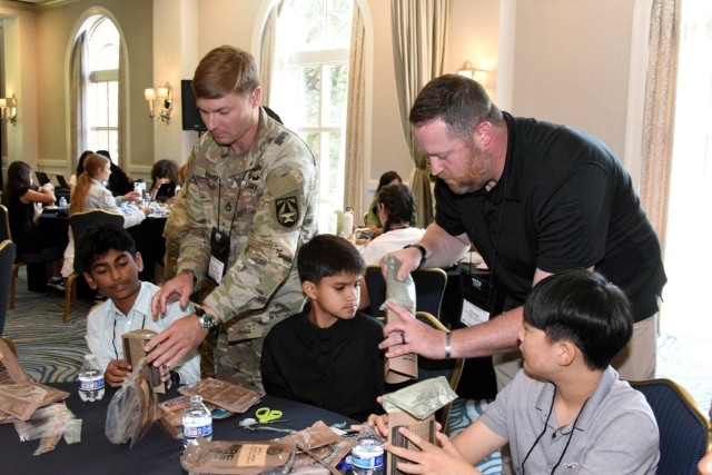 Competitors enjoying an MRE lunch.