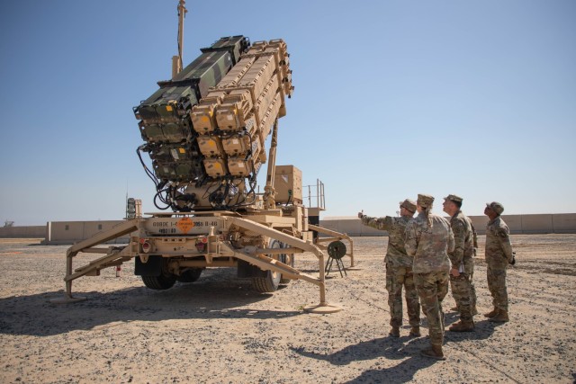 Col. Peter Gilbert, commander, 3rd Expeditionary Sustainment Command, discusses Patriot Battery Readiness – with Soldiers assigned to 1st Battalion, 44th Air Defense Artillery Regiment, in the U.S. Central Command area of responsibility, Feb....