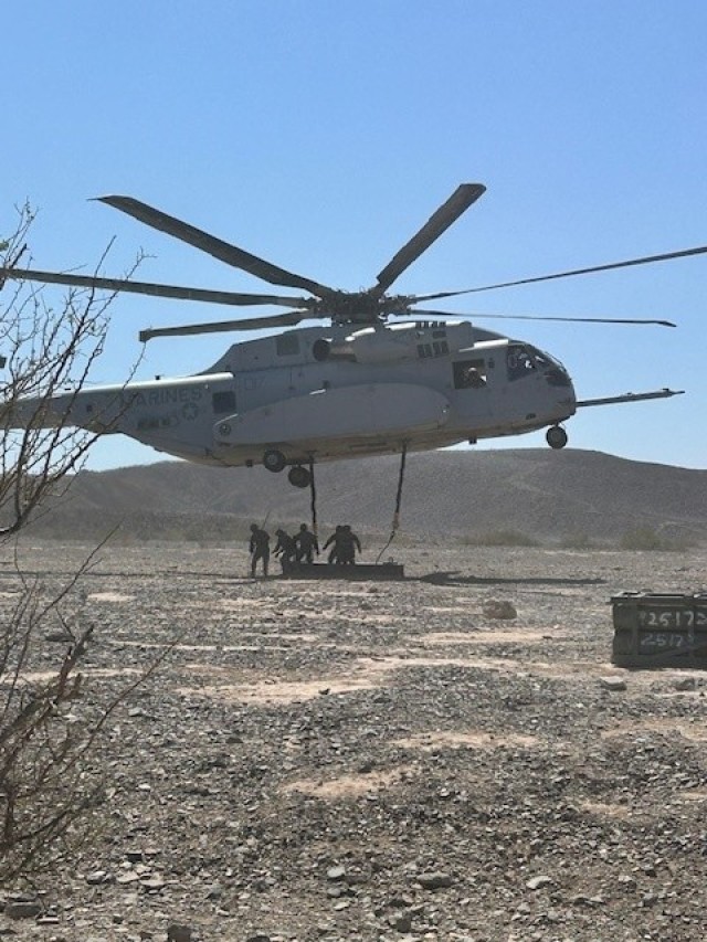 Soldiers from the Airborne Test Force at Yuma Test Center and the Marines from the Marine Operational Test and Evaluation Squadron 1 at Marine Corps Air Station-Yuma recently worked together for a Helicopter Sling Load Training. Sing load...