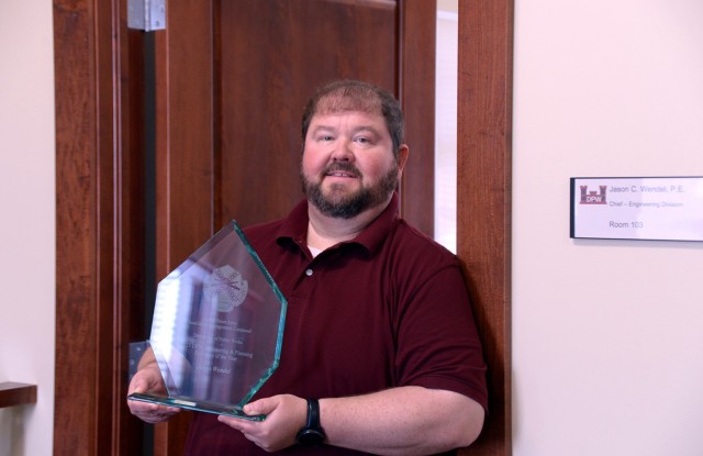 Directorate of Public Works Engineering Division Chief Jason Wendel, seen here July 22, 2025, at his office at Fort Leavenworth, Kansas, was named the 2023 DPW Engineering and Planning Executive of the Year for Installation Management Command....