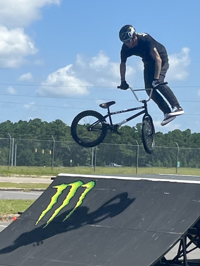 The BMX stunt team performing a trick at the Exchange&#39;s 130th Anniversary Bash.