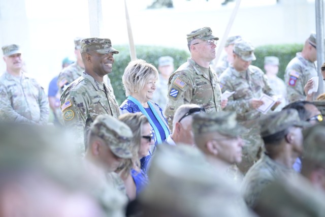 From left, Lt. Gen. Kevin D. Admiral, commanding general of III Armored Corps and Fort Hood, and Mitzi Huffman, daughter of Col. Robert B. Hood, talk alongside Col. Mark McClellan, U.S. Army Garrison-Fort Hood commander, as they prepare for the...