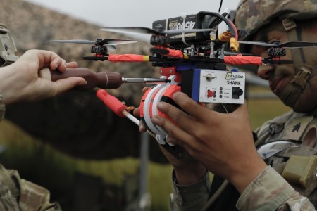U.S. Army Sgt. Elena Killough and Sgt. Demond Blach, assigned to the Deathwatch Platoon, 10th Brigade Engineer Battalion, 1st Armored Brigade Combat Team, 3rd Infantry Division, prepare an Unmanned Aircraft System during a first person view individual qualification on Grafenwöhr Training Area, July 21, 2025. The 1st ABCT, 3rd Infantry Division, tests purpose-built, retrievable FPV drones to highlight the ability against autonomous targets to improve battlefield readiness and integration with armored units. The 1st Infantry Division and V Corps are part of America’s Forward Deployed Corps in Europe which works alongside NATO Allies and regional security partners to provide combat-ready forces, execute joint and multinational training exercises, and retain command and assigned units in the European Theater.