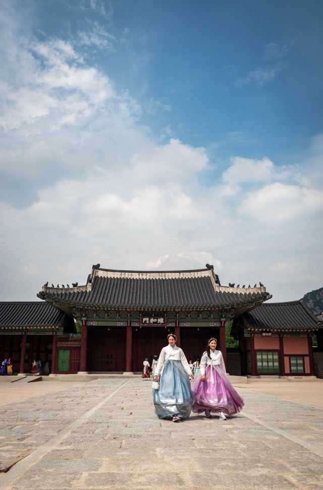 Women dressed in historic attire walk through the grounds at Gyeongbokgung Palace in Seoul, Korea, July 31, 2025. U.S. Army Soldiers serving at Camp Casey traveled to Seoul on a trip hosted by Gyeonggi-Do province as part of an effort to welcome...