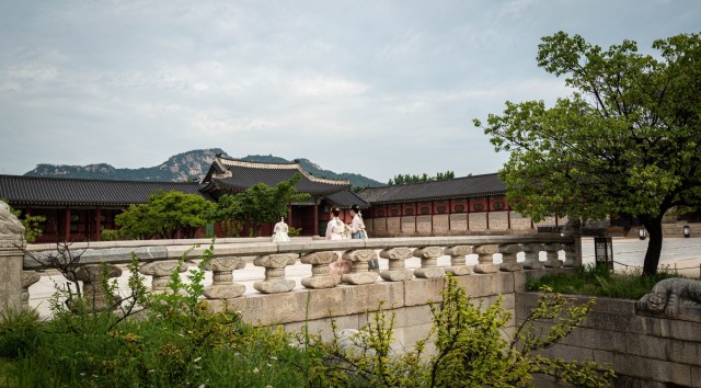 Women dressed in historic attire walk through the grounds at Gyeongbokgung Palace in Seoul, Korea, July 31, 2025. U.S. Army Soldiers serving at Camp Casey traveled to Seoul on a trip hosted by Gyeonggi-Do province as part of an effort to welcome...