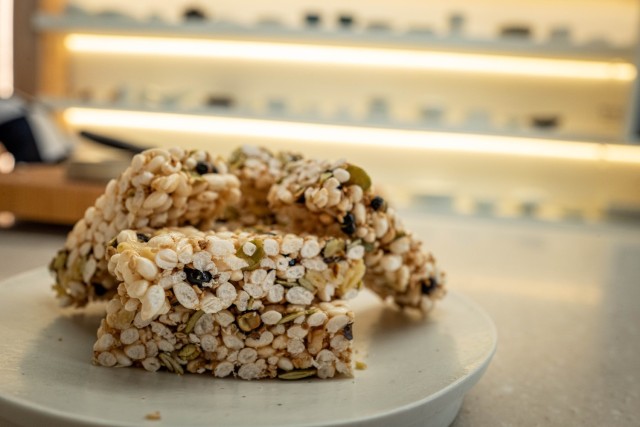 Korean pop rice snacks sit on a counter at the Hansik Space E:EUM, a place dedicated to teaching visitors about Korean culture and food, in Seoul, July 31, 2025. Soldiers serving at Camp Casey traveled to Seoul on a trip hosted by Gyeonggi-Do...