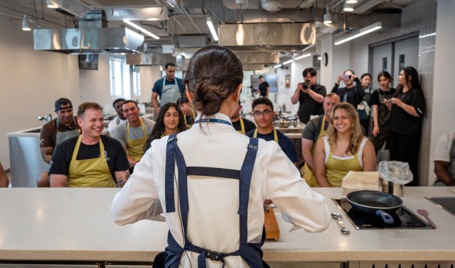 Seung An Oh, an instructor at the Hansik Space E:EUM, a place dedicated to teaching visitors about Korean culture and food, shows U.S. Army Soldiers how to make Korean pop rice snacks in Seoul, July 31, 2025. Soldiers serving at Camp Casey...
