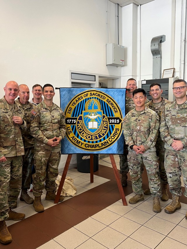 Chaplains from the Vicenza Military Community stand next to a handmade quilt made by community members, Lynn and Terry Sim to celebrate the 250th anniversary of the Chaplain Corps. The celebration was held at the Caserma Ederle Chapel on July 29,...