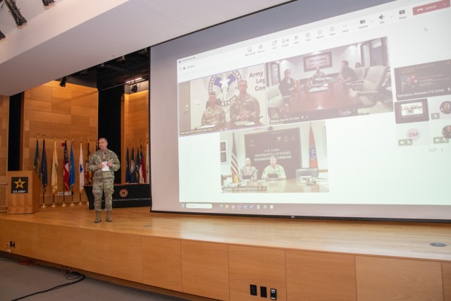 CECOM Commanding General Maj. Gen. James D. Turinetti IV greets outstations AMLC, TYAD, and ISLC remotely via Microsoft Teams during the summer CECOM Town Hall at Myer Auditorium on July 29, 2025.