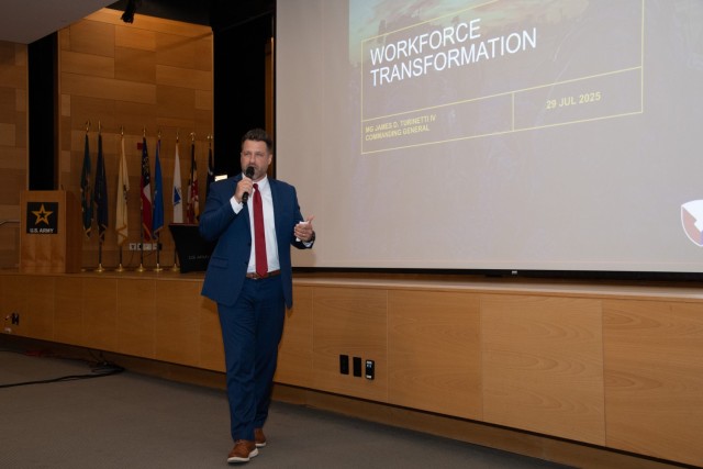 CECOM Transformation Director Drew Rehkop updates the community on Army Continuous Transformation during the summer CECOM Town Hall at Myer Auditorium on July 29, 2025.