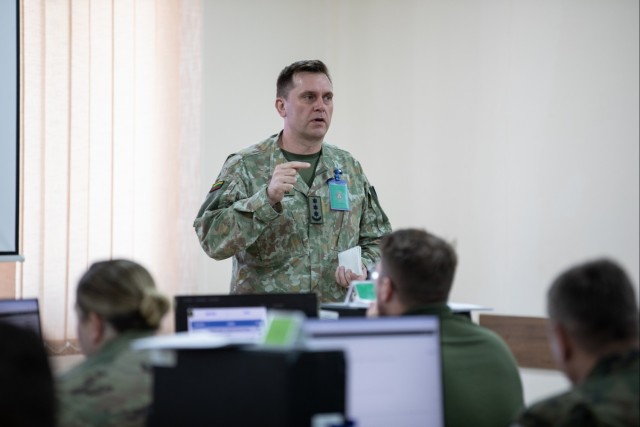 Lithuanian Officer Provides Operational Guidance to Multinational Staff