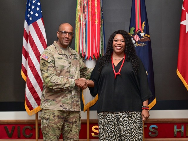 Gen. Gary Brito recognizes Shanda Misse-Ndong for receiving the DoD Spirit of Hope Award