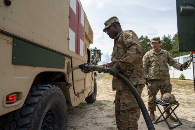 1st Armored Division sustainment Soldiers coordinate logistics for convoy protection