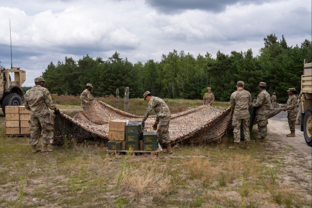 1st Armored Division sustainment Soldiers coordinate logistics for convoy protection